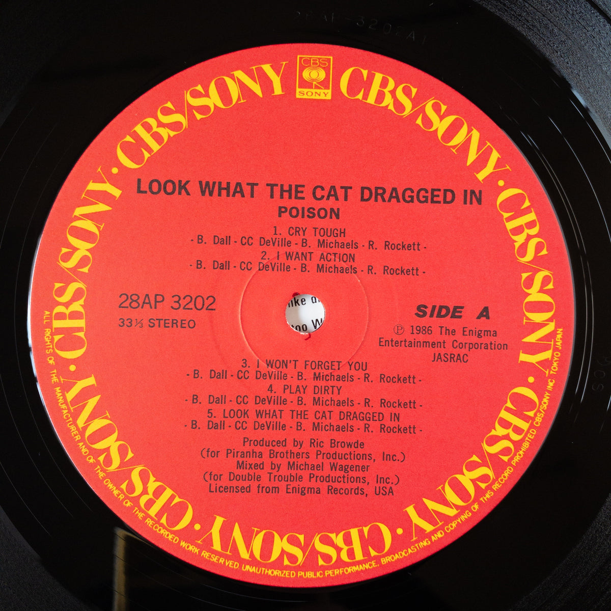 Poison – Look What The Cat Dragged In LP